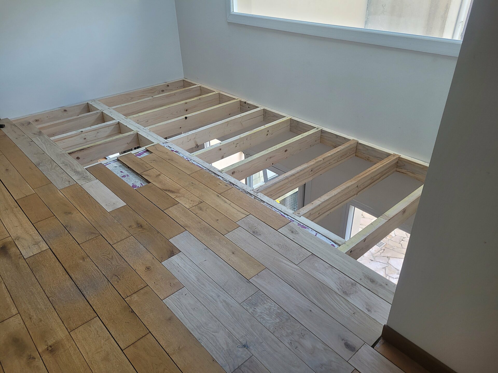 Extention d'un parquet massif chêne cloué sur solive, Romainville, 2024