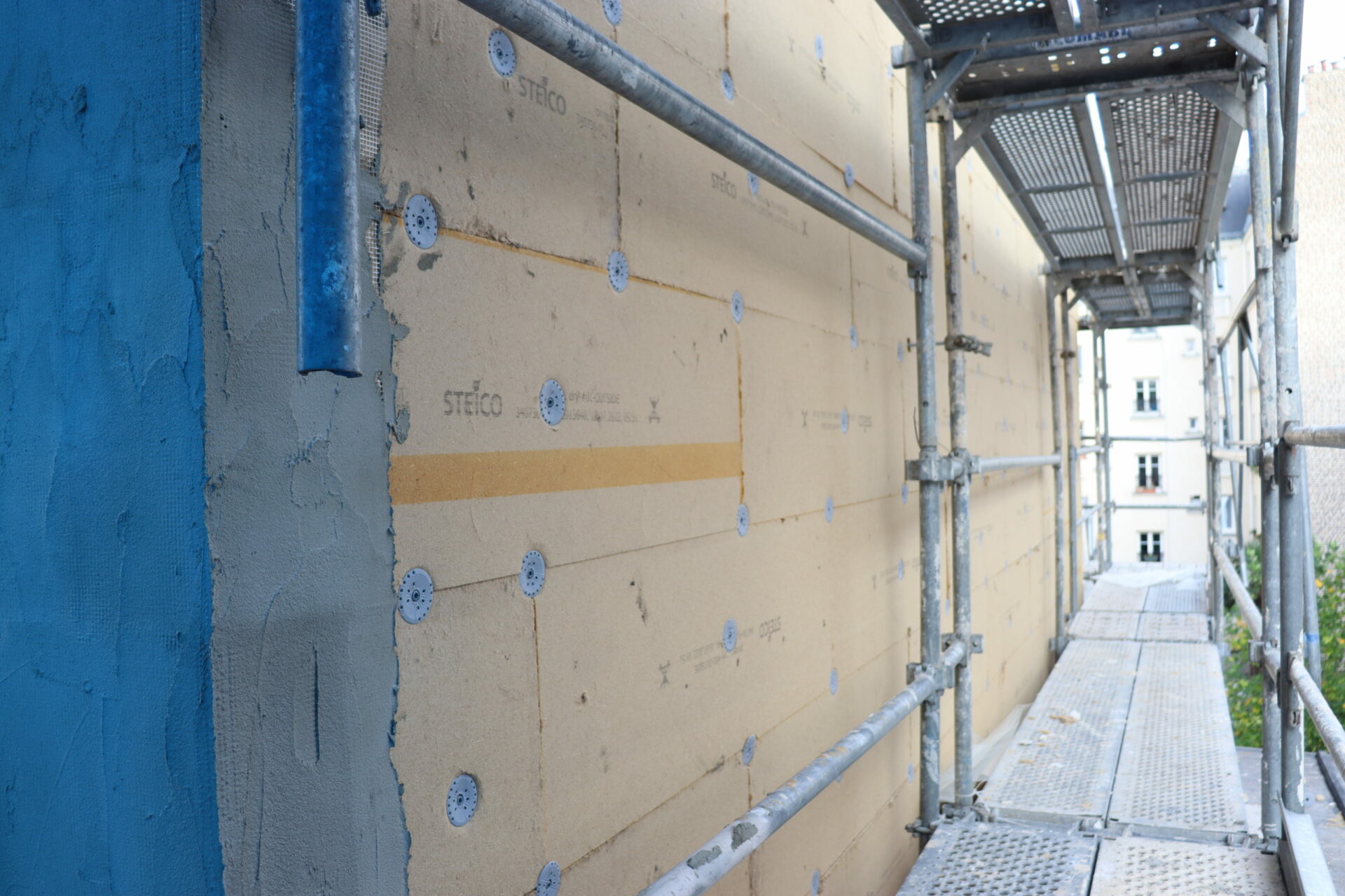 Isolation par l'extérieur en laine de bois, Paris, 2024